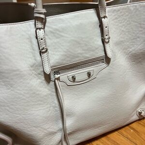 I carried this Balenciaga only 2-3 times. It is in great condition.